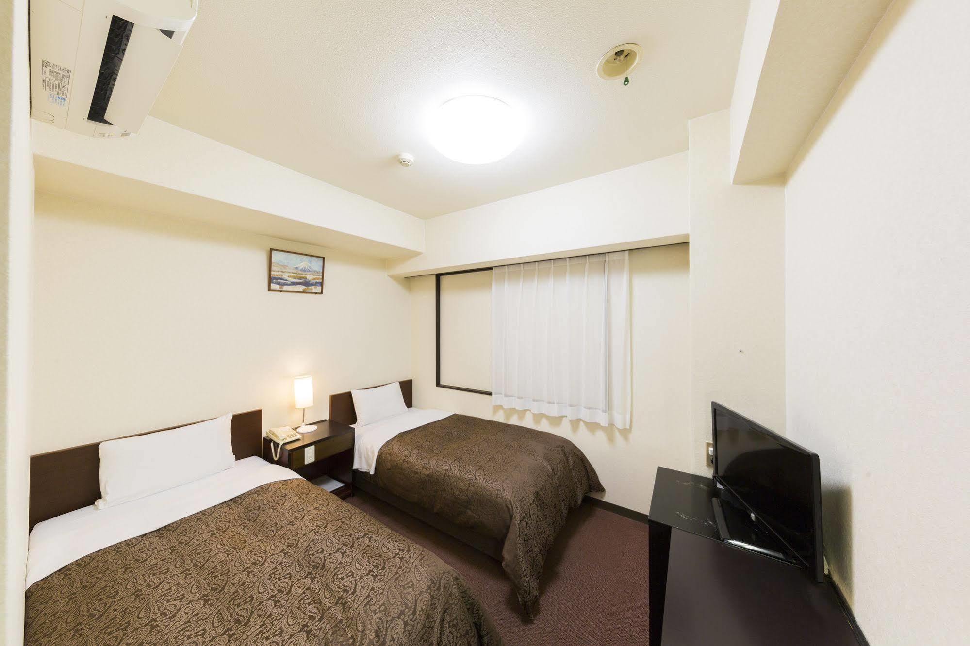 Dai-Ni Sunny Stone Hotel Суйта Экстерьер фото